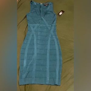 Guess body con dress. Brand new. Size small.